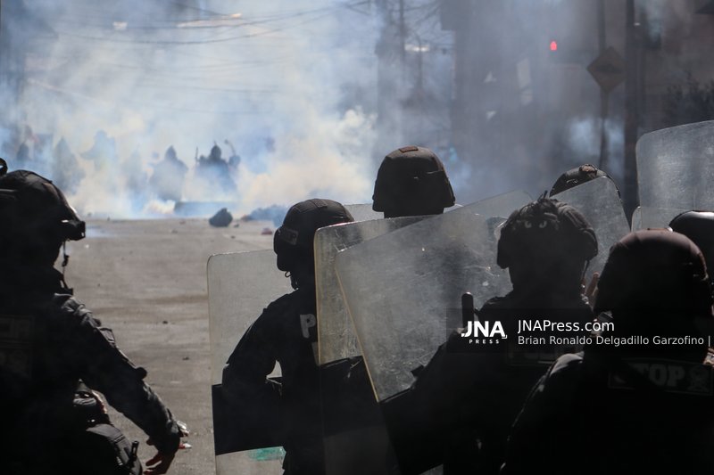 Mass Protests March from El Alto to La Paz Demanding President’s Resignation