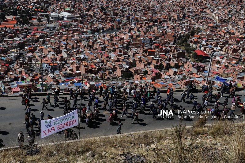 Mass Protests March from El Alto to La Paz Demanding President’s Resignation