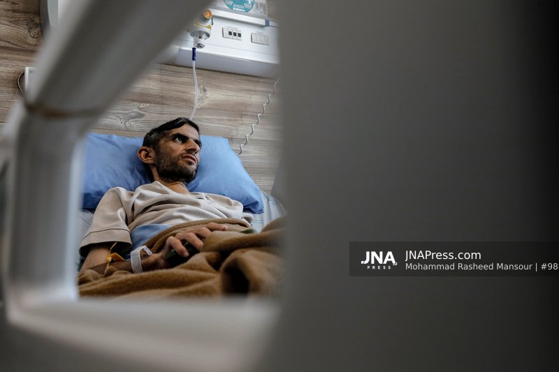 Former Palestinian prisoner and journalist receives treatment after reported medical complications