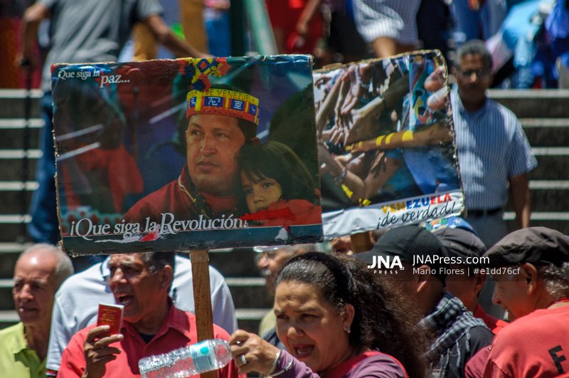 Protesters in Caracas demand transparency over oil agreement with United States