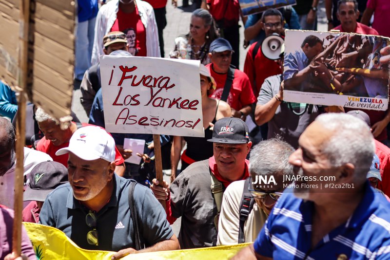 Protesters in Caracas demand transparency over oil agreement with United States