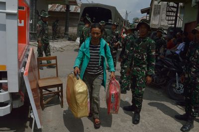 Residents evacuate as Mount Sinabung activity intensifies