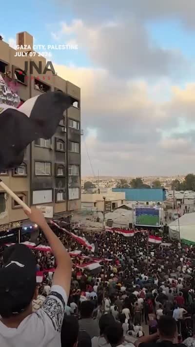 Egyptian fans watch the Egypt-Argentina match in the streets and squares 