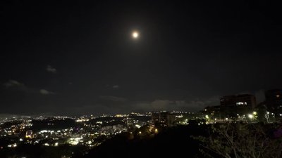 Full moon rises over Caracas following recent earthquakes  DESCRIPTION