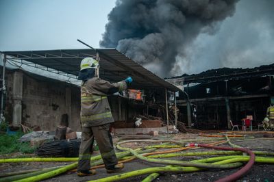 Firefighters battle factory blaze in East Jakarta