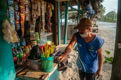 Local Communities Affected by Ash from the Eruption of Mount Anak Krakatau in Banten, Indonesia