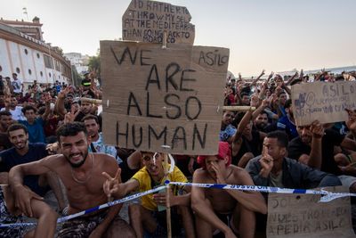 Migrants protest in Ceuta chanting, "No asylum, no food"