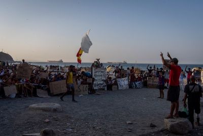 Migrants protest in Ceuta chanting, "No asylum, no food"