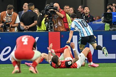 Legendary Messi sinks Austria to send Argentina through to the knockout stage