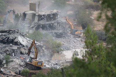 Israeli forces demolish two residential buildings in Birzeit