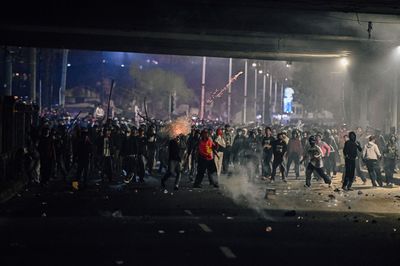 Protesters clash with security forces in Jakarta