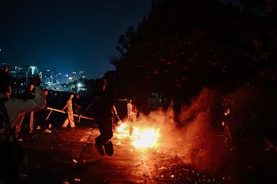 Protesters clash with security forces in Jakarta