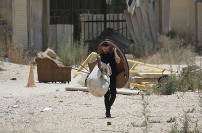 Palestinians Pass Through Checkpoint Near Nur Shams Refugee Camp