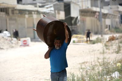 Palestinians Pass Through Checkpoint Near Nur Shams Refugee Camp