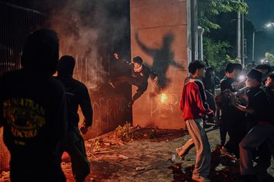 Protesters clash with security forces in Jakarta