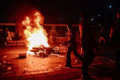 Protesters clash with security forces in Jakarta