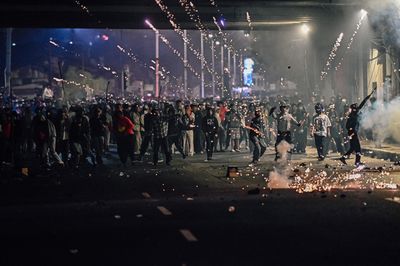 Protesters clash with security forces in Jakarta