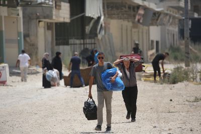 Palestinians Pass Through Checkpoint Near Nur Shams Refugee Camp