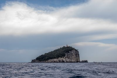 Storm clouds gather over Italy's Gulf of La Spezia after earthquake ahead of partial solar eclipse
