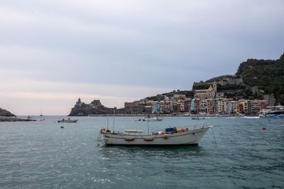 Storm clouds gather over Italy's Gulf of La Spezia after earthquake ahead of partial solar eclipse