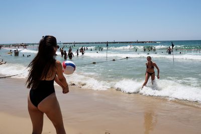 Israelis Flock to Tel Aviv Beach Amid Summer Heat