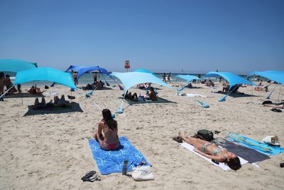 Israelis Flock to Tel Aviv Beach Amid Summer Heat