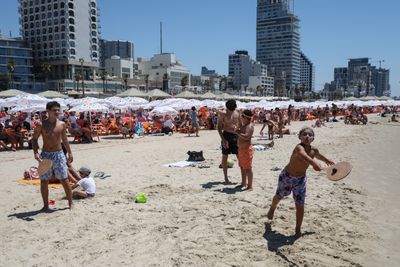 Israelis Flock to Tel Aviv Beach Amid Summer Heat