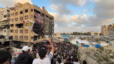 Football Fans Gather Beside Destroyed Tower in Gaza to Watch Egypt–Argentina Match