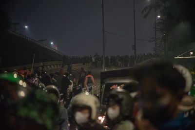 Police disperse protesters during demonstration in Jakarta