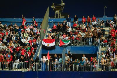 Egyptians gather to watch the match between Egypt and Argentina in the round of 16 of the World Cup in clubs and streets